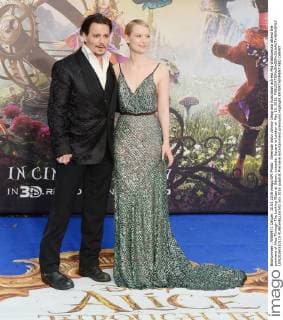 American actor Johnny Depp and Australian actress Mia Wasikowska attend the premiere of Alice Through The Looking Glass at Odeon, Leicester Square in London on May 10, 2016.  LON20160510118 RUNExHELLESTAD
