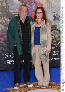 American film-maker Terry Gilliam and partner attending the Alice Through the Looking Glass European premiere, held at London s Odeon Leicester Square. MAY 10th 2016  JWNx161358