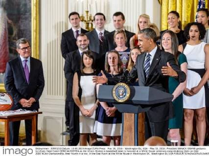 May 10, 2016 - Washington Dc, USA - May 10, 2016: President BARACK OBAMA gestures to UConn Head Coach GENO AURIEMMA as the UConn Women s basketball team is honored at a White House ceremony congratulating them on their 2016 NCAA Championship, their fourth in a row, in the East Room at the White House in Washington DC. Washington Dc USA - ZUMAs125