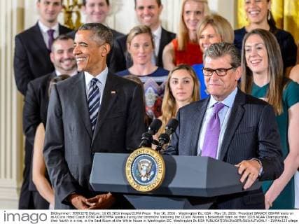 May 10, 2016 - Washington Dc, USA - May 10, 2016: President BARACK OBAMA looks on as UConn Head Coach GENO AURIEMMA speaks during the ceremony honoring the UConn Women s basketball team on their 2016 NCAA Championship, their fourth in a row, in the East Room at the White House in Washington DC. Washington Dc USA - ZUMAs125
