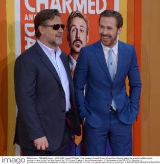 Cast members Russell Crowe (L) and Ryan Gosling attend the premiere of the motion picture comedy thriller The Nice Guys at the TCL Chinese Theatre in the Hollywood section of Los Angeles on May 10, 2016. Storyline: A private eye investigates the apparent suicide of a fading porn star in 1970s Los Angeles and uncovers a conspiracy.  LAP2016051009 JIMxRUYMEN