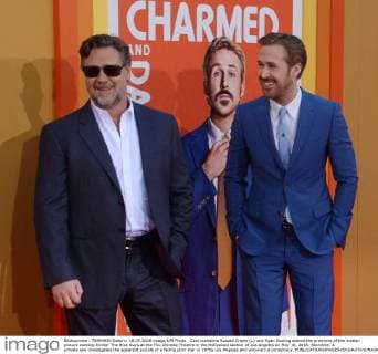 Cast members Russell Crowe (L) and Ryan Gosling attend the premiere of the motion picture comedy thriller The Nice Guys at the TCL Chinese Theatre in the Hollywood section of Los Angeles on May 10, 2016. Storyline: A private eye investigates the apparent suicide of a fading porn star in 1970s Los Angeles and uncovers a conspiracy.  LAP2016051012 JIMxRUYMEN