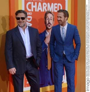Cast members Russell Crowe (L) and Ryan Gosling attend the premiere of the motion picture comedy thriller The Nice Guys at the TCL Chinese Theatre in the Hollywood section of Los Angeles on May 10, 2016. Storyline: A private eye investigates the apparent suicide of a fading porn star in 1970s Los Angeles and uncovers a conspiracy.  LAP2016051010 JIMxRUYMEN