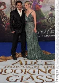 Alice Through The Looking Glass - European Premiere London. UK. Johnny Depp and Mia Wasikowska at The European Premiere of Alice Through The Looking Glass at Leicester Square Garden, London, England, UK on Tuesday 10 May 2016 LMK370-22697-071010 