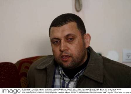 Feb 06, 2011 - Gaza City, Gaza Strip - AYMAN NOFAL (C), a top Hamas armed commander, sits with his family (not seen) at his home in Nusairat in the Central Gaza strip. He returned to the Gaza Strip on Saturday after breaking out of a Cairo jail during the political upheaval in Egypt, sources in the Palestinian Islamist movement said. They said Ayman Nofal had been arrested in the Egyptian Sinai in early 2008. - ZUMAap3_