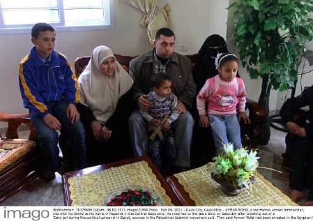 Feb 06, 2011 - Gaza City, Gaza Strip - AYMAN NOFAL a top Hamas armed commander, sits with his family at his home in Nusairat in the Central Gaza strip. He returned to the Gaza Strip on Saturday after breaking out of a Cairo jail during the political upheaval in Egypt, sources in the Palestinian Islamist movement said. They said Ayman Nofal had been arrested in the Egyptian Sinai in early 2008. - ZUMAap3_