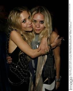 Feb 07, 2011 - Los Angeles, California, U.S. - ASHLEY OLSEN and MARY KATE OLSEN (Olsen Twins) pose at a party in Los Angeles. - ZUMAl55_