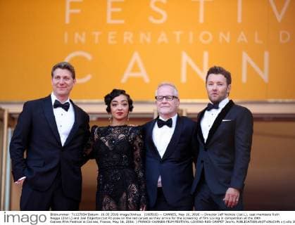 (160516) -- CANNES, May 16, 2016 -- Director Jeff Nichols (1st L), cast members Ruth Negga (2nd L) and Joel Edgerton(1st R) pose on the red carpet as they arrive for the screening of film Loving in competition at the 69th Cannes Film Festival in Cannes, France, May 16, 2016. ) FRANCE-CANNES-FILM FESTIVAL-LOVING-RED CARPET JinxYu 