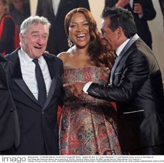 Robert De Niro (L), Grace Hightower (C) and Roberto Duran arrive on the steps of the Palais des Festivals before the screening of the film Hands of Stone during the 69th annual Cannes International Film Festival in Cannes, France on May 16, 2016.  CAN20160516816 DAVIDxSILPA