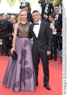Cannes, France - CANNES, FRANCE - MAY 16: Football player Hatem Ben Arfa and a guest attend the Loving premiere during the 69th annual Cannes Film Festival at the Palais des Festivals on May 16, 2016 in Cannes, France. Cannes France - ZUMAi09_