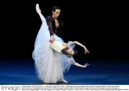 Rome Opera House principal ballet dancers Rebecca Bianchi (front) and Claudio Cocino perform the pas de deux dance from French composer Adolphe Adam s Giselle ballet as part of a gala concert given by the nominees of Benois de la Danse-2016 on the New Stage of the Bolshoi Theatre in Moscow, Russia, May 17, 2016. Sergei Bobylev TASS  TS0237F5