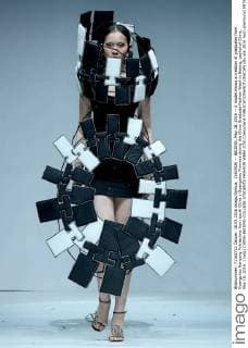 (160518) -- BEIJING, May 18, 2016 -- A model shows a creation of graduates from Guangzhou Nanyang Polytechnic from south China s Guangzhou Province during the China Graduate Fashion Week in Beijing, capital of China, May 18, 2016. ) (wjq) CHINA-BEIJING-COLLEGE STUDENTS FASHION WEEK (CN) ChenxJianli 