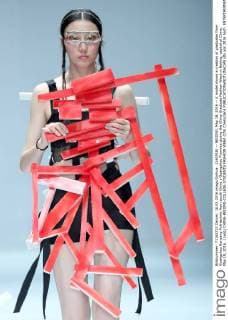(160518) -- BEIJING, May 18, 2016 -- A model shows a creation of graduates from Guangzhou Nanyang Polytechnic from south China s Guangzhou Province during the China Graduate Fashion Week in Beijing, capital of China, May 18, 2016. ) (wjq) CHINA-BEIJING-COLLEGE STUDENTS FASHION WEEK (CN) ChenxJianli 