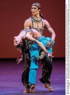 Mariinsky Theatre principal dancers Nadezhda Batoeva (front) and Kim Kimin perform in a scene from Russian composer Nikolai Rimsky-Korsakov s Scheherazade, staged by Mikhail Fokin, as part of a gala concert given by the nominees of Benois de la Danse-2016 on the New Stage of the Bolshoi Theatre in Moscow, Russia, May 17, 2016. Sergei Bobylev TASS  TS023804