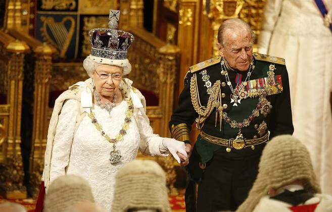 May 18, 2016 - London, GREAT BRITAIN - Britain s Queen Elizabeth II with Prince Phillip look at the assembled lawmakers after she read the Queen s Speech from the throne during the State Opening of Parliament in the House of Lords in London, Wednesday, May, 18, 2016. The State Opening of Parliament marks the formal start of the parliamentary year and the Queen s Speech sets out the government s agenda for the coming session. London GREAT BRITAIN - ZUMAp124