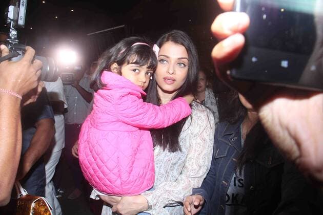 MUMBAI, INDIA - MAY 18: Bollywood actor Aishwarya Rai Bachchan with her daughter Aaradhya Bachchan and mother Brinda Rai, returning from Cannes, France, at airport, on May 18, 2016 in Mumbai, India. (Photo by Pramod Thakur Hindustan Times ) Bollywood Celebs At Mumbai Airport
