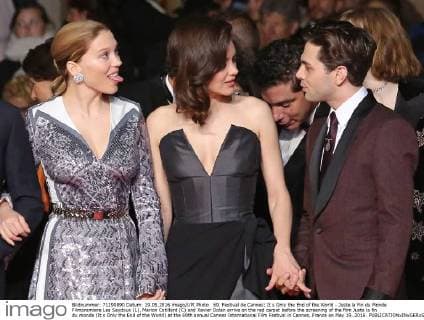 69. Festival de Cannes: It s Only the End of the World - Juste la Fin du Monde Filmpremiere Lea Seydoux (L), Marion Cotillard (C) and Xavier Dolan arrive on the red carpet before the screening of the film Juste la fin du monde (It s Only the End of the World) at the 69th annual Cannes International Film Festival in Cannes, France on May 19, 2016.  CAN20160519802 DAVIDxSILPA