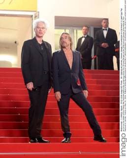 69. Festival de Cannes: Gimme Danger Filmpremiere Jim Jarmusch (L) and Iggy Pop arrive on the steps of the Palais des Festivals before the screening of the film Gimme Danger at the 69th annual Cannes International Film Festival in Cannes, France on May 19, 2016.  CAN20160519847 DAVIDxSILPA