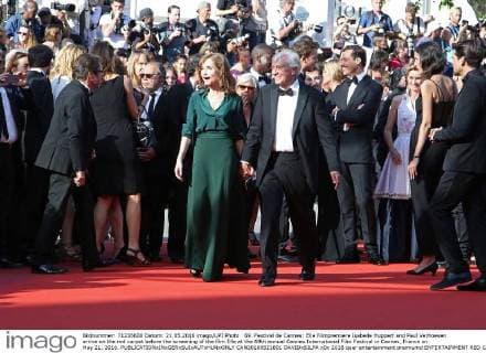 69. Festival de Cannes: Elle Filmpremiere Isabelle Huppert and Paul Verhoeven arrive on the red carpet before the screening of the film Elle at the 69th annual Cannes International Film Festival in Cannes, France on May 21, 2016.  CAN20160521801 DAVIDxSILPA