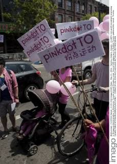 May 21, 2016 - Toronto, Ontario, Canada - A LGBT+ non-profit movement originating in Singapore demonstration in Downtown Toronto around Chinatown area. Around 100 supporters of PinkDot Toronto gathered the march. Toronto Canada - ZUMAd114