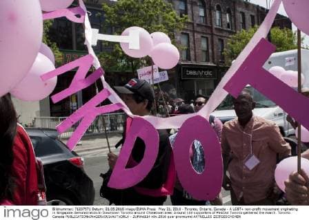 May 21, 2016 - Toronto, Ontario, Canada - A LGBT+ non-profit movement originating in Singapore demonstration in Downtown Toronto around Chinatown area. Around 100 supporters of PinkDot Toronto gathered the march. Toronto Canada - ZUMAd114