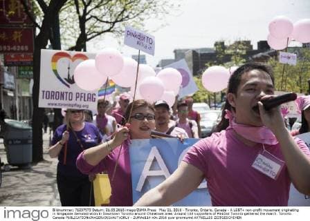 May 21, 2016 - Toronto, Ontario, Canada - A LGBT+ non-profit movement originating in Singapore demonstration in Downtown Toronto around Chinatown area. Around 100 supporters of PinkDot Toronto gathered the march. Toronto Canada - ZUMAd114