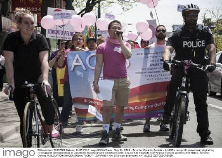 May 21, 2016 - Toronto, Ontario, Canada - A LGBT+ non-profit movement originating in Singapore demonstration in Downtown Toronto around Chinatown area. Around 100 supporters of PinkDot Toronto gathered the march. Toronto Canada - ZUMAd114