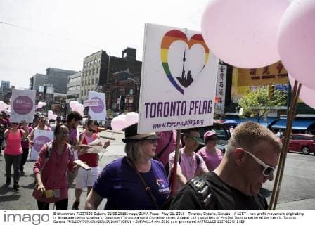 May 21, 2016 - Toronto, Ontario, Canada - A LGBT+ non-profit movement originating in Singapore demonstration in Downtown Toronto around Chinatown area. Around 100 supporters of PinkDot Toronto gathered the march. Toronto Canada - ZUMAd114