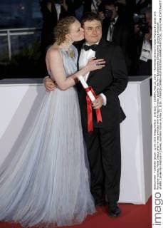 (160522) -- CANNES, May 22, 2016 -- Romanian director Cristian Mungiu(R) poses with Romanian actress Maria Dragus after he was awarded with the Best Director prize for the film Bacalaureate (Graduation) during a photocall at 69th Cannes Film Festival in Cannes, southern France on May 22, 2016. ) FRANCE-CANNES-FILM FESTIVAL-AWARD-PHOTOCALL JinxYu 