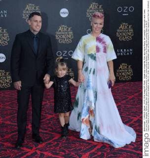 Singer and songwriter Pink, aka Alecia Moore, her husband, motorcycle racer Carey Hart and their daughter Willow Sage Hart attend the premiere of the motion picture fantasy Alice Through the Looking Glass at the El Capitan Theatre in the Hollywood section of Los Angeles on May 23, 2016. Storyline: Nineteen-year-old Alice returns to the magical world from her childhood adventure, where she reunites with her old friends and learns of her true destiny: to end the Red Queen s reign of terror.  LAP2016052308 JIMxRUYMEN