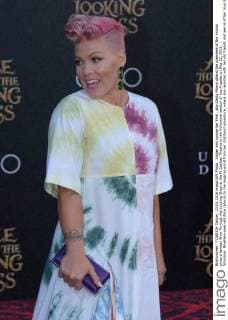 Singer and songwriter Pink , aka Alecia Moore attend the premiere of the motion picture fantasy Alice Through the Looking Glass at the El Capitan Theatre in the Hollywood section of Los Angeles on May 23, 2016. Storyline: Nineteen-year-old Alice returns to the magical world from her childhood adventure, where she reunites with her old friends and learns of her true destiny: to end the Red Queen s reign of terror.  LAP2016052312 JIMxRUYMEN
