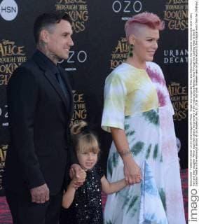 Singer and songwriter Pink, aka Alecia Moore, her husband, motorcycle racer Carey Hart and their daughter Willow Sage Hart attend the premiere of the motion picture fantasy Alice Through the Looking Glass at the El Capitan Theatre in the Hollywood section of Los Angeles on May 23, 2016. Storyline: Nineteen-year-old Alice returns to the magical world from her childhood adventure, where she reunites with her old friends and learns of her true destiny: to end the Red Queen s reign of terror.  LAP2016052314 JIMxRUYMEN