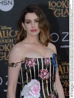 Cast member Anne Hathaway attends the premiere of the motion picture fantasy Alice Through the Looking Glass at the El Capitan Theatre in the Hollywood section of Los Angeles on May 23, 2016. Storyline: Nineteen-year-old Alice returns to the magical world from her childhood adventure, where she reunites with her old friends and learns of her true destiny: to end the Red Queen s reign of terror.  LAP2016052323 JIMxRUYMEN