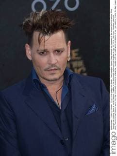 Cast member Johnny Depp attends the premiere of the motion picture fantasy Alice Through the Looking Glass at the El Capitan Theatre in the Hollywood section of Los Angeles on May 23, 2016. Storyline: Nineteen-year-old Alice returns to the magical world from her childhood adventure, where she reunites with her old friends and learns of her true destiny: to end the Red Queen s reign of terror.  LAP2016052304 JIMxRUYMEN