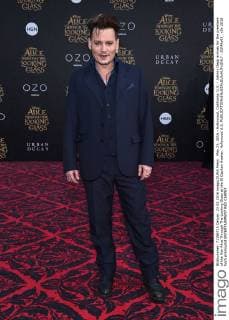 May 23, 2016 - Hollywood, California, U.S. - Johnny Depp arrives for the premiere of the film Alice Through The Looking Glass at the El Capitan theater. Hollywood U.S. - ZUMAo05_