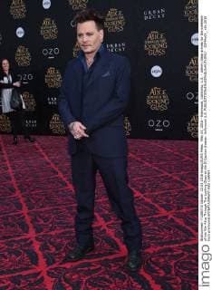 May 23, 2016 - Hollywood, California, U.S. - Johnny Depp arrives for the premiere of the film Alice Through The Looking Glass at the El Capitan theater. Hollywood U.S. - ZUMAo05_