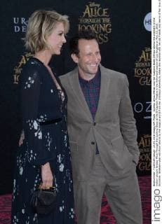 Actress Jenna Elfman and her husband Bodhi Elfman attend the premiere of the motion picture fantasy Alice Through the Looking Glass at the El Capitan Theatre in the Hollywood section of Los Angeles on May 23, 2016. Storyline: Nineteen-year-old Alice returns to the magical world from her childhood adventure, where she reunites with her old friends and learns of her true destiny: to end the Red Queen s reign of terror.  LAP2016052343 JIMxRUYMEN