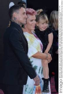 Singer and songwriter Pink, aka Alecia Moore, her husband, motorcycle racer Carey Hart and their daughter Willow Sage Hart attend the premiere of the motion picture fantasy Alice Through the Looking Glass at the El Capitan Theatre in the Hollywood section of Los Angeles on May 23, 2016. Storyline: Nineteen-year-old Alice returns to the magical world from her childhood adventure, where she reunites with her old friends and learns of her true destiny: to end the Red Queen s reign of terror.  LAP2016052353 JIMxRUYMEN