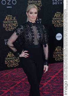 Actress Erika Jayne attends the premiere of the motion picture fantasy Alice Through the Looking Glass at the El Capitan Theatre in the Hollywood section of Los Angeles on May 23, 2016. Storyline: Nineteen-year-old Alice returns to the magical world from her childhood adventure, where she reunites with her old friends and learns of her true destiny: to end the Red Queen s reign of terror.  LAP2016052339 JIMxRUYMEN