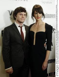 Evan Peters and Carolina Bartcza arrive on the red carpet at a New York screening of X-Men Apocalypse on May 24, 2016 in New York City.  NYP20160524102 JOHNxANGELILLO