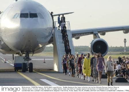 Models displayed the latest collection during the Ultimate Runway Fashion Show at Helsinki Airport, Finland, on May 24, 2016. A unique fashion show was held on Tuesday night at the Runway 2 of Helsinki Airport, which was transformed into a catwalk and enabled seven designers from China, Korea, Japan, the UK, Sweden, Denmark and Finland to present their collections. ) FINLAND-HELSINKI-AIRPORT FASHION SHOW SergeixStepanov 