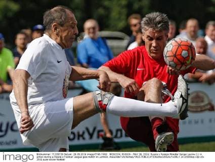 MOSCOW, RUSSIA - MAY 28, 2016: Russia s Foreign Minister Sergei Lavrov (L) in action during a People s Football League gala match in Luzhniki. Alexander Shcherbak TASS  24125906sp