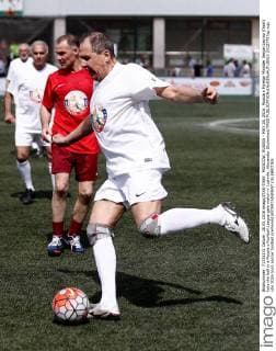 MOSCOW, RUSSIA - MAY 28, 2016: Russia s Foreign Minister Sergei Lavrov (front) licks the ball in a People s Football League gala match in Luzhniki. Alexander Shcherbak TASS  24127767sp