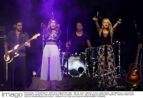 May 28, 2016 - Daytona, Florida, United States - Cassadee Pope (L) and Brooke Eden perform during the Great American Music Fest at Daytona - Country 500 - Day 2 at Daytona International Speedway. Daytona United States - ZUMAw109