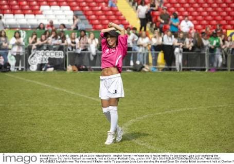 English former The Voice and X Factor reality TV pop singer Lydia Lucy attending the annual Soccer Six charity football tournament, held at Charlton Football Club, London. MAY 28th 2016  DFLx161613