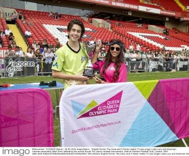 English former The Voice and X Factor reality TV pop singer Lydia Lucy and American internet personality Nash Grier attending the annual Soccer Six charity football tournament, held at Charlton Football Club, London. MAY 28th 2016  DFLx161613