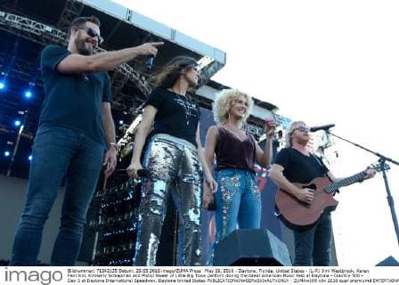 May 29, 2016 - Daytona, Florida, United States - (L-R) Jimi Westbrook, Karen Fairchild, Kimberly Schlapman and Phillip Sweet of Little Big Town perform during the Great American Music Fest at Daytona - Country 500 - Day 3 at Daytona International Speedway. Daytona United States - ZUMAw109