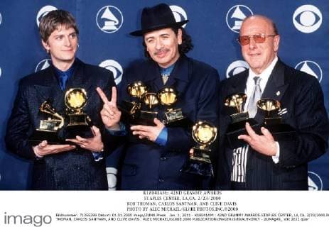 Jan. 1, 2011 - K18041AM:: 42ND GRAMMY AWARDS.STAPLES CENTER, LA,CA. 2 23 2000.ROB THOMAN, CARLOS SANTNAN, AND CLIVE DAVIS . ALEC MICHAEL GL0BE 2000 - ZUMAg49_
