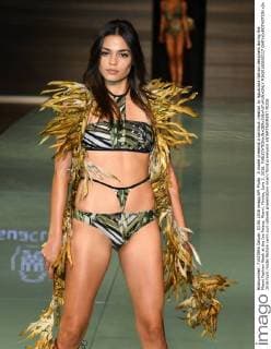 A model presents a swimsuit creation by Aguaclara fashion designers during the Miami Fashion Week at the Ice Palace, Miami, Florida, June 3, 2016.  MIA20160603117 GARYxIxROTHSTEIN