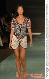 A model presents a beachwear creation by Custo Barcelona fashion designers during the Miami Fashion Week at the Ice Palace, Miami, Florida, June 3, 2016.  MIA20160603305 GARYxIxROTHSTEIN